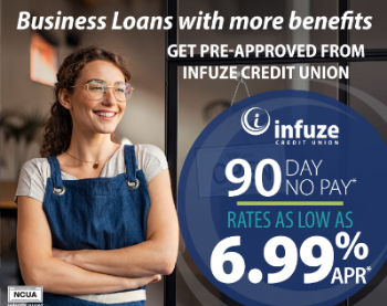 Woman with apron smiling. Caption reads "business loans with more benefits"